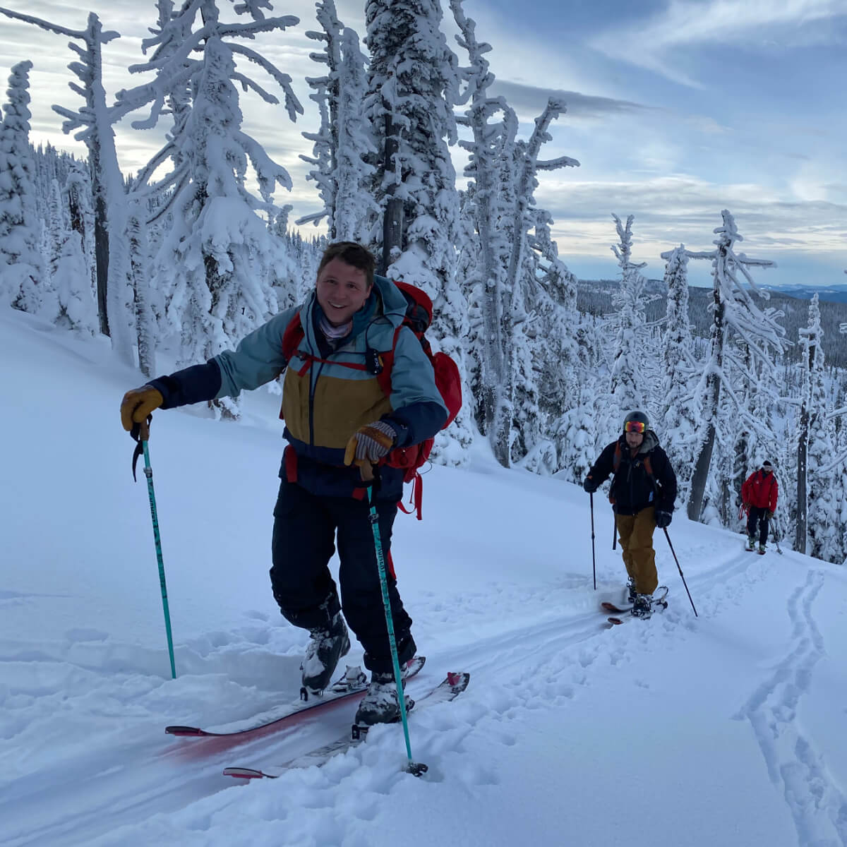 Skinning up while backcountry skiing